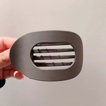 Clipia - Bind dit hår op. Slip for ubehag.